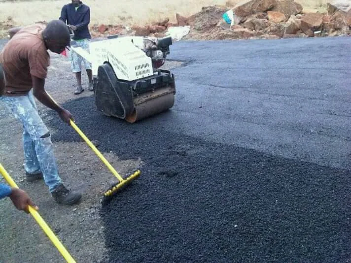 Munash team working on asphalt surfacing