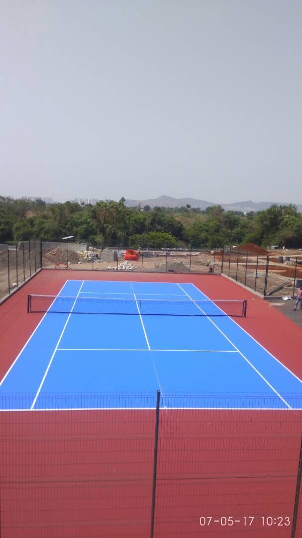 New blue and red tennis court installation